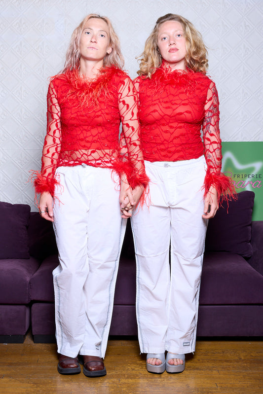 PANTALON BLANC RÉFLECTIF DANS LE NOIR